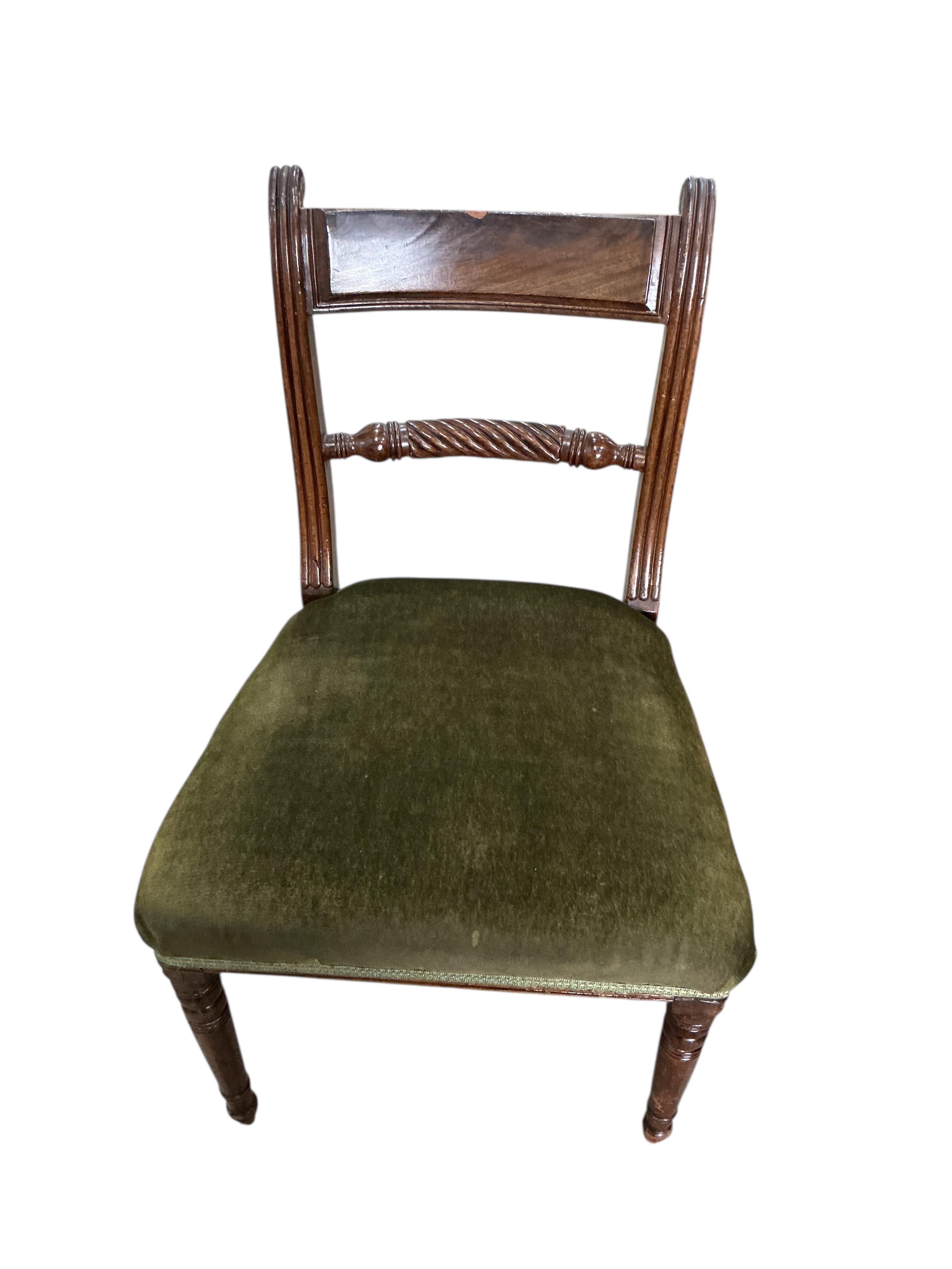 A set of four Regency style mahogany dining chairs, a.f.